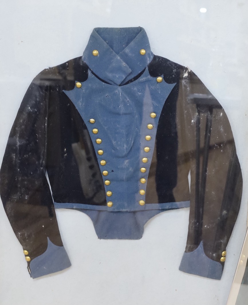 A rare Dart and Erme Yeoman Cavalry felt tunic, c.1822-28, mounted with gilt buttons D & E over Y C, framed and glazed